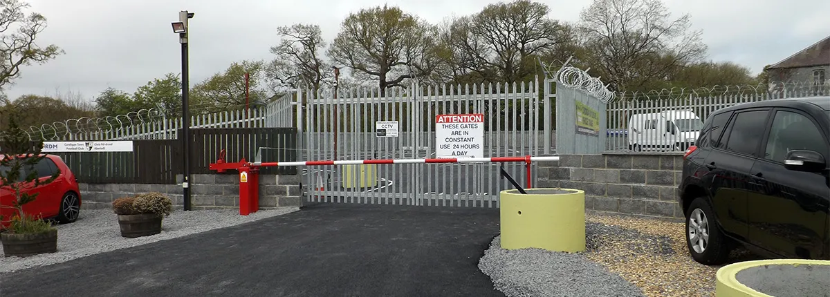 Secure entrance gates with barrier