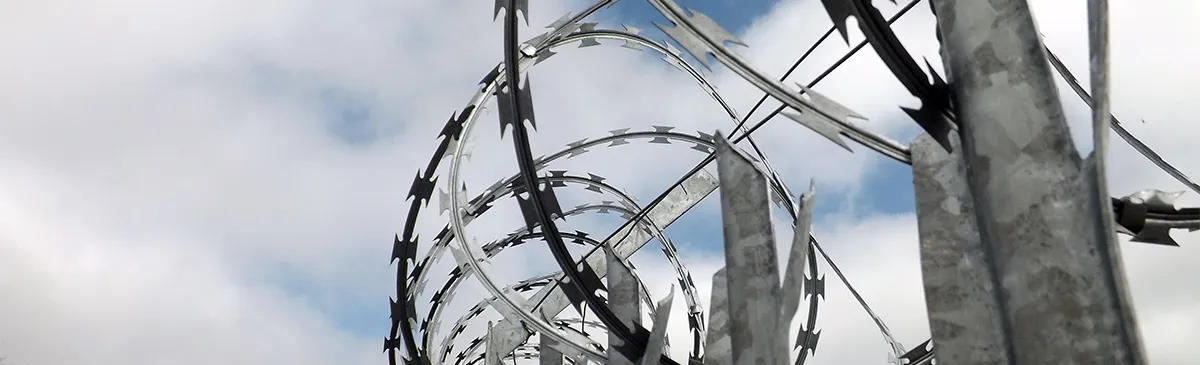 Razor wire on the perimeter fence